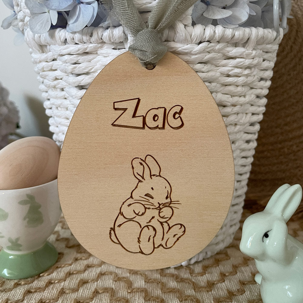 EASTER EGG SHAPED TAG WITH EASTER BUNNY SITTING