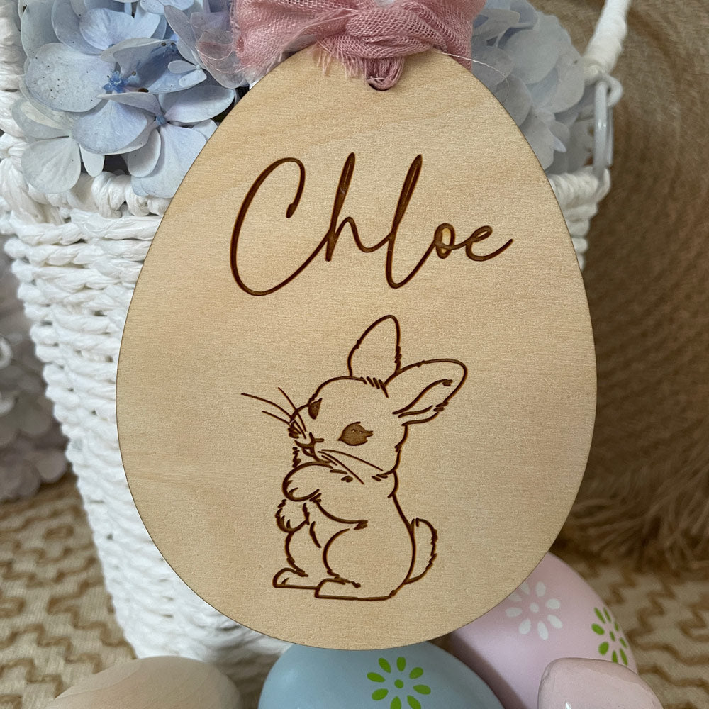 EASTER EGG SHAPED TAG WITH EASTER BUNNY HOPPING